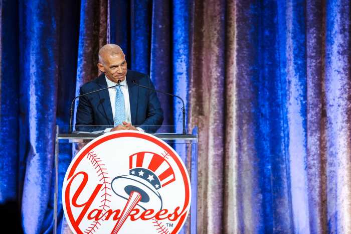 y former Yankees manager and three-time Yankees World Series winning catcher Joe Girardi accepting the “Pride of the Yankees” award.