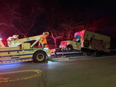 The heavy-duty tow truck removed a tractor-trailor off of the Throgs Neck Expressway service road.