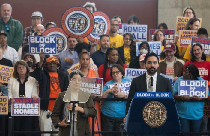 Tenants, housing advocates, and union members stand behind Mayor Mamdani as he outlines the city's plan to build and preserve affordable housing over the next decade.