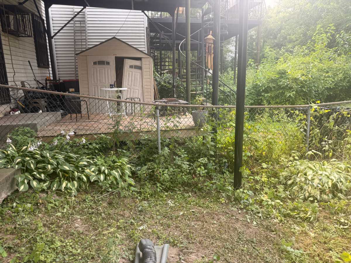 The fencing in Cliff Muniz's backyard is sinking along with the soil in his backyard. As HOA president, Muniz has led the effort to start repairs for the Villa Maria homeowners.