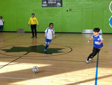 Alejandro Pareja Nazario (pictured right) was one of the 27 player escorts sent by South Bronx United to walk out alongside international soccer players for the World Cup matches at NYNJ Stadium.