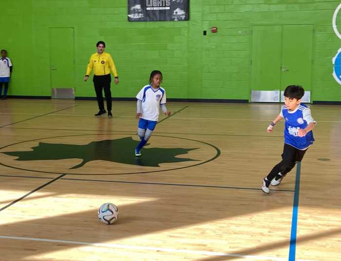 Alejandro Pareja Nazario (pictured right) was one of the 27 player escorts sent by South Bronx United to walk out alongside international soccer players for the World Cup matches at NYNJ Stadium.
