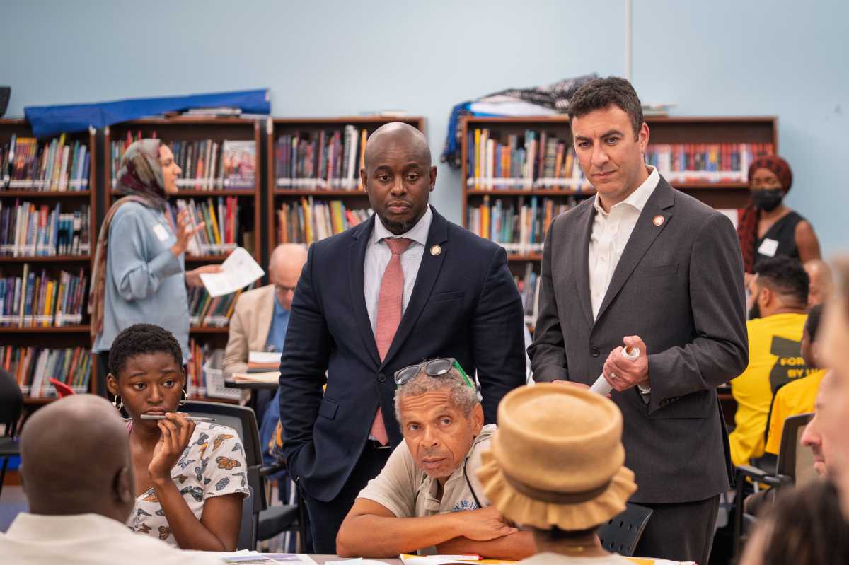 Councilmembers Kevin Riley and Eric Dinowitz listen in on community members concerns and hopes for White Plains Road.