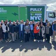 Hunts Point community stakeholders from the Bronx is Breathing project celebrate the launch of three electric trucks that will be supporting City Harvest deliveries.