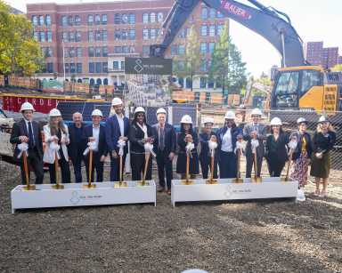 City officials and development partners break ground on Sol on Park at Morris Houses, the largest use of the "Transfer of Assistance" program to date.