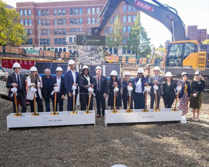 City officials and development partners break ground on Sol on Park at Morris Houses, the largest use of the "Transfer of Assistance" program to date.