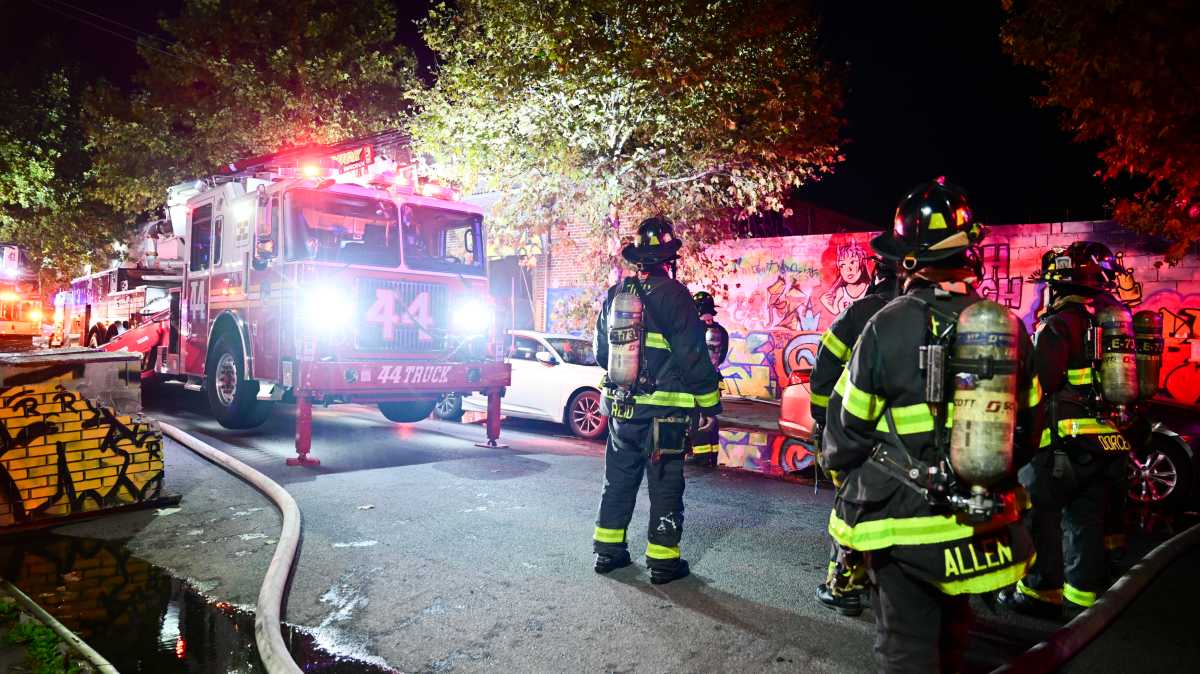 A hundred firefighters battled a two alarm fire at 1717 West Farms Road in the Bronx on Thursday, October 15.