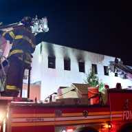 Multiple Tower Ladders knocked down the main body of fire at 1717 West Farms Road on Thursday morning.