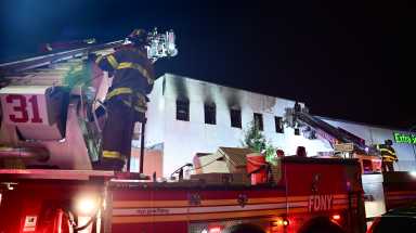 Multiple Tower Ladders knocked down the main body of fire at 1717 West Farms Road on Thursday morning.