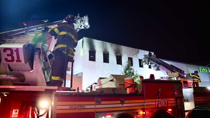 Multiple Tower Ladders knocked down the main body of fire at 1717 West Farms Road on Thursday morning.
