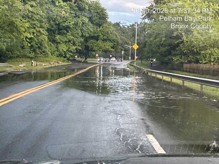 Dashcam photos shows flooding in Pelham Bay Park in August, leaving the road impassable.